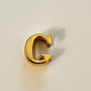 Prada My Character Sliding Gold-tone Metal Letter “G”